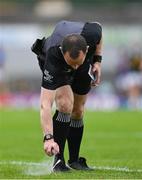 21 June 2025; Referee Jerome Henry sprays vanising foam to mark the position for a free kick during the GAA Football All-Ireland Senior Championship preliminary quarter-final match between Kerry and Cavan at Fitzgerald Stadium in Killarney, Kerry. Photo by Brendan Moran/Sportsfile