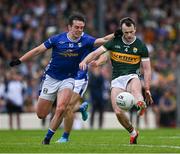 21 June 2025; Tom O'Sullivan of Kerry in action against Gerard Smith of Cavan during the GAA Football All-Ireland Senior Championship preliminary quarter-final match between Kerry and Cavan at Fitzgerald Stadium in Killarney, Kerry. Photo by Brendan Moran/Sportsfile