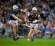21 June 2025; Colm Molloy of Galway is tackled by Craig Morgan of Tipperary during the GAA Hurling All-Ireland Senior Championship quarter-final match between Galway and Tipperary at TUS Gaelic Grounds in Limerick. Photo by Ray McManus/Sportsfile