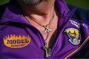21 June 2025; The necklace of Wexford supporter John Ryan is seen during the John West Féile na nGael Camogie and Hurling National Finals at Halo Tiles Wexford GAA Centre of Excellence in Ferns, Wexford. Photo by Shauna Clinton/Sportsfile