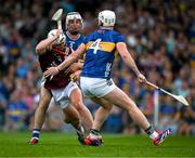 21 June 2025; Colm Molloy of Galway is tackled by Craig Morgan and Michael Breen, 4, of Tipperary during the GAA Hurling All-Ireland Senior Championship quarter-final match between Galway and Tipperary at TUS Gaelic Grounds in Limerick. Photo by Ray McManus/Sportsfile