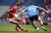 21 June 2025; Sean McDonnell of Cork in action against John Small of Dublin during the GAA Football All-Ireland Senior Championship preliminary quarter-final match between Dublin and Cork at Croke Park in Dublin. Photo by Ramsey Cardy/Sportsfile
