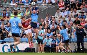 21 June 2025; Ciaran Kilkenny of Dublin in action against Sean McDonnell of Cork during the GAA Football All-Ireland Senior Championship preliminary quarter-final match between Dublin and Cork at Croke Park in Dublin. Photo by Ramsey Cardy/Sportsfile