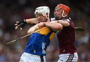 21 June 2025; Bryan O'Mara of Tipperary is tackled by Conor Whelan of Galway during the GAA Hurling All-Ireland Senior Championship quarter-final match between Galway and Tipperary at TUS Gaelic Grounds in Limerick. Photo by Ray McManus/Sportsfile