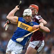 21 June 2025; Bryan O'Mara of Tipperary is tackled by Conor Whelan of Galway during the GAA Hurling All-Ireland Senior Championship quarter-final match between Galway and Tipperary at TUS Gaelic Grounds in Limerick. Photo by Ray McManus/Sportsfile