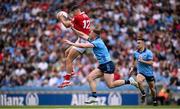 21 June 2025; Sean McDonnell of Cork in action against John Small of Dublin during the GAA Football All-Ireland Senior Championship preliminary quarter-final match between Dublin and Cork at Croke Park in Dublin. Photo by Ramsey Cardy/Sportsfile