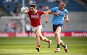 21 June 2025; Paul Walsh of Cork in action against Peadar Ó Cofaigh Byrne of Dublin during the GAA Football All-Ireland Senior Championship preliminary quarter-final match between Dublin and Cork at Croke Park in Dublin. Photo by Ramsey Cardy/Sportsfile