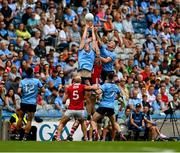 21 June 2025; Peadar Ó Cofaigh Byrne of Dublin in action against Ian Maguire of Cork during the GAA Football All-Ireland Senior Championship preliminary quarter-final match between Dublin and Cork at Croke Park in Dublin. Photo by Daire Brennan/Sportsfile