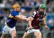 21 June 2025; Cianan Fahy of Galway is tackled by Jake Morris of Tipperary during the GAA Hurling All-Ireland Senior Championship quarter-final match between Galway and Tipperary at TUS Gaelic Grounds in Limerick. Photo by Ray McManus/Sportsfile