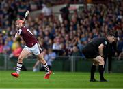 21 June 2025; Referee Sean Stack ducks as Conor Whelan of Galway fires in a shot during the GAA Hurling All-Ireland Senior Championship quarter-final match between Galway and Tipperary at TUS Gaelic Grounds in Limerick. Photo by Ray McManus/Sportsfile