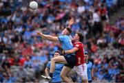 21 June 2025; Paddy Small of Dublin in action against Neil Lordan of Cork during the GAA Football All-Ireland Senior Championship preliminary quarter-final match between Dublin and Cork at Croke Park in Dublin. Photo by Ramsey Cardy/Sportsfile