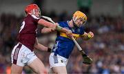 21 June 2025; Andrew Ormond of Tipperary is tackled by Ronan Glennon of Galway during the GAA Hurling All-Ireland Senior Championship quarter-final match between Galway and Tipperary at TUS Gaelic Grounds in Limerick. Photo by Ray McManus/Sportsfile