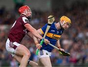 21 June 2025; Andrew Ormond of Tipperary is tackled by Ronan Glennon of Galway during the GAA Hurling All-Ireland Senior Championship quarter-final match between Galway and Tipperary at TUS Gaelic Grounds in Limerick. Photo by Ray McManus/Sportsfile