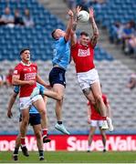 21 June 2025; Ciaran Kilkenny of Dublin and Seán Walsh of Cork during the GAA Football All-Ireland Senior Championship preliminary quarter-final match between Dublin and Cork at Croke Park in Dublin. Photo by Ramsey Cardy/Sportsfile