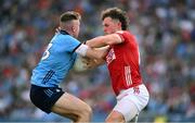 21 June 2025; Paddy Small of Dublin in action against Neil Lordan of Cork during the GAA Football All-Ireland Senior Championship preliminary quarter-final match between Dublin and Cork at Croke Park in Dublin. Photo by Ramsey Cardy/Sportsfile