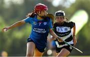 21 June 2025; Aoibhinn Donnelly of Kilmaley in action against Hannah Hughes of Turloughmore during the Camogie Division 1 Final match between Turloughmore and Kilmaley during the John West Féile na nGael Camogie and Hurling National Finals at Halo Tiles Wexford GAA Centre of Excellence in Ferns, Wexford. Photo by Shauna Clinton/Sportsfile