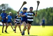 21 June 2025; Meabh Connellan of Kilmaley in action against Natasha Feeney of Turloughmore during the Camogie Division 1 Final match between Turloughmore and Kilmaley during the John West Féile na nGael Camogie and Hurling National Finals at Halo Tiles Wexford GAA Centre of Excellence in Ferns, Wexford. Photo by Shauna Clinton/Sportsfile