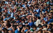 21 June 2025; Supporters in the Cusack stand shield their eyes from the sun during the GAA Football All-Ireland Senior Championship preliminary quarter-final match between Dublin and Cork at Croke Park in Dublin. Photo by Daire Brennan/Sportsfile