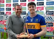 21 June 2025; Andrew Ormond of Tipperary is presented with the Bord Gáis Energy Man of the Match Award by Damien Crilly, Bord Gáis Energy, after the GAA Hurling All-Ireland Senior Championship quarter-final match between Galway and Tipperary at TUS Gaelic Grounds in Limerick. Photo by Ray McManus/Sportsfile