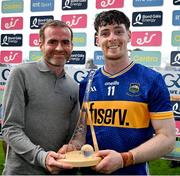 21 June 2025; Andrew Ormond of Tipperary is presented with the Bord Gáis Energy Man of the Match Award by Damien Crilly, Bord Gáis Energy, after the GAA Hurling All-Ireland Senior Championship quarter-final match between Galway and Tipperary at TUS Gaelic Grounds in Limerick. Photo by Ray McManus/Sportsfile
