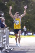 18 September 2004; Gary Crossan, Letterkenny, approaches the finish line to win the adidas BHAA Dublin half-marathon. Phoenix Park, Dublin. Picture credit; Brian Lawless / SPORTSFILE