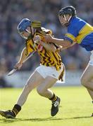 18 September 2004; Sean O'Neill, Kilkenny, in action against Conor O'Mahoney, Tipperary. Erin All-Ireland U21 Hurling Championship Final, Kilkenny v Tipperary, Nowlan Park, Kilkenny. Picture credit; Damien Eagers / SPORTSFILE