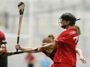 19 September 2004; Mairead Holland, Cork, in action against Fionnuala Carr, Down. All-Ireland Junior Camogie Championship Final, Cork v Down, Croke Park, Dublin. Picture credit; Pat Murphy / SPORTSFILE