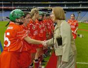 19 September 2004; President of the Camogie Association Miriam O'Callaghan meets the Cork players before the game. All-Ireland Junior Camogie Championship Final, Cork v Down, Croke Park, Dublin. Picture credit; Ray McManus / SPORTSFILE