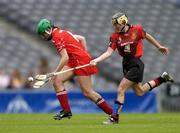 19 September 2004; Amanda O'Regan, Cork, in action against Mairin McAleenan, Down. All-Ireland Junior Camogie Championship Final, Cork v Down, Croke Park, Dublin. Picture credit; Ray McManus / SPORTSFILE
