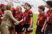 19 September 2004; President of the Camogie Association Miriam O'Connell meets the Down players before the game. All-Ireland Junior Camogie Championship Final, Cork v Down, Croke Park, Dublin. Picture credit; Ray McManus / SPORTSFILE