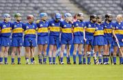 19 September 2004; The Tipperary team stand for the national anthem. Foras na Gaeilge Senior Camogie Championship All-Ireland Final, Tipperary v Cork, Croke Park, Dublin. Picture credit; Ray McManus / SPORTSFILE