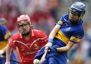 19 September 2004; Una O'Dwyer, Tipperary, in action against Elaine Burke, Cork. Foras na Gaeilge Senior Camogie Championship All-Ireland Final, Tipperary v Cork, Croke Park, Dublin. Picture credit; Ray McManus / SPORTSFILE