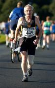 18 September 2004; Paddy Craddock warms up before the adidas BHAA Dublin half-marathon. Phoenix Park, Dublin. Picture credit; Brian Lawless / SPORTSFILE