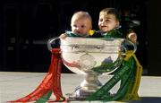24 September 2004; Six month old Jack Ward, wearing the Kerry jersey, and Ella May Whelan, six and a half months, wearing the Mayo jersey, at a photocall with the Sam Maguire Cup ahead of the Bank of Ireland Senior Football Championship final. Bank of Ireland Head Office, Baggot Street, Dublin. Picture credit; Ray McManus / SPORTSFILE