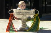 24 September 2004; Six and a half old Ella May Whelan, wearing a Mayo jersey, at a photocall with the Sam Maguire Cup ahead of the Bank of Ireland Senior Football Championship final. Bank of Ireland Head Office, Baggot Street, Dublin. Picture credit; Ray McManus / SPORTSFILE