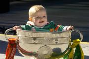 24 September 2004; Six and a half month old Ella May Whelan, wearing the Mayo jersey, at a photocall with the Sam Maguire Cup ahead of the Bank of Ireland Senior Football Championship final. Bank of Ireland Head Office, Baggot Street, Dublin. Picture credit; Ray McManus / SPORTSFILE
