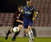 24 September 2004; Sean Prunty, Longford Town, in action against James Keddy, Bohemians. eircom league, Premier Division, Bohemians v Longford Town, Dalymount Park, Dublin. Picture credit; Brian Lawless / SPORTSFILE
