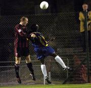 24 September 2004; Thomas Heary, Bohemians, in action against Eric Lavine, Longford Town. eircom league, Premier Division, Bohemians v Longford Town, Dalymount Park, Dublin. Picture credit; Brian Lawless / SPORTSFILE