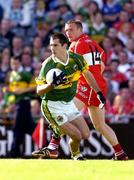 29 August 2004; Tom O'Sullivan, Kerry, in action against Paddy Bradley, Derry. Bank of Ireland Senior Football Championship Semi-Final, Derry v Kerry, Croke Park, Dublin. Picture credit; Ray McManus / SPORTSFILE