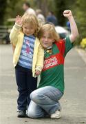 25 September 2004; Eight year old Clara Tierney, right, with her sister Helen, three years, from Westport, Co. Mayo, pictured outside the Mayo team Hotel, CityWest Hotel, Saggart, Co. Dublin. Picture credit; Damien Eagers / SPORTSFILE