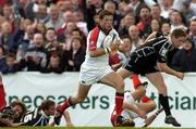 25 September 2004; Bryn Cunningham, Ulster, goes past the Neath / Swansea Ospreys defence to score the opening try. Celtic League 2004-2005, Ulster v Neath / Swansea Ospreys, Ravenhill, Belfast. Picture credit; Matt Browne / SPORTSFILE