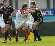 25 September 2004; Bryn Cunningham, Ulster, is tackled by Andy Newman, Neath / Swansea Ospreys. Celtic League 2004-2005, Ulster v Neath / Swansea Ospreys, Ravenhill, Belfast. Picture credit; Matt Browne / SPORTSFILE