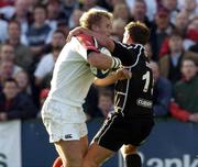 25 September 2004; Roger Wilson, Ulster, is tackled by Adrian Durston, Neath / Swansea Ospreys. Celtic League 2004-2005, Ulster v Neath / Swansea Ospreys, Ravenhill, Belfast. Picture credit; Matt Browne / SPORTSFILE