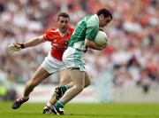 7 August 2004; Niall Bogue, Fermanagh, in action against Diarmuid Marsden, Armagh. Bank of Ireland All-Ireland Senior Football Championship Quarter Final, Armagh v Fermanagh, Croke Park, Dublin. Picture credit; Brendan Moran / SPORTSFILE