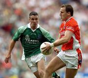 7 August 2004; Paddy McKeever, Armagh, in action against Mark Little, Fermanagh. Bank of Ireland All-Ireland Senior Football Championship Quarter Final, Armagh v Fermanagh, Croke Park, Dublin. Picture credit; Brendan Moran / SPORTSFILE
