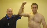 25 September 2004; Jonathan Magee, right, with Michael Carruth after victory over Quentin Hann. Charity boxing match, Jonathan Magee v Quentin Hann, National Stadium, Dublin. Picture credit; Damien Eagers / SPORTSFILE