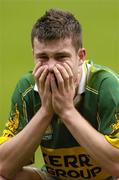 26 September 2004; Padraig Reidy, Kerry, at the end of the game after defeat by Tyrone. All-Ireland Minor Football Championship Final, Kerry v Tyrone, Croke Park, Dublin. Picture credit; Ray McManus / SPORTSFILE *** Local Caption *** Any photograph taken by SPORTSFILE during, or in connection with, the 2004 All-Ireland Minor Football Final which displays GAA logos or contains an image or part of an image of any GAA intellectual property, or, which contains images of a GAA player/players in their playing uniforms, may only be used for editorial and non-advertising purposes.  Use of photographs for advertising, as posters or for purchase separately is strictly prohibited unless prior written approval has been obtained from the Gaelic Athletic Association.