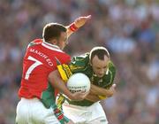 26 September 2004; John Crowley, Kerry, in action against Fergal Kelly, Mayo. Bank of Ireland All-Ireland Senior Football Championship Final, Kerry v Mayo, Croke Park, Dublin. Picture credit; Ray McManus / SPORTSFILE *** Local Caption *** Any photograph taken by SPORTSFILE during, or in connection with, the 2004 Bank of Ireland All-Ireland Senior Football Final which displays GAA logos or contains an image or part of an image of any GAA intellectual property, or, which contains images of a GAA player/players in their playing uniforms, may only be used for editorial and non-advertising purposes.  Use of photographs for advertising, as posters or for purchase separately is strictly prohibited unless prior written approval has been obtained from the Gaelic Athletic Association.