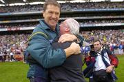 26 September 2004; Kerry manager Jack O'Connor celebrates with Sean Walsh, chariman of the Kerry County Board, at the final whistle after victory over Mayo. Bank of Ireland All-Ireland Senior Football Championship Final, Kerry v Mayo, Croke Park, Dublin. Picture credit; Brendan Moran / SPORTSFILE *** Local Caption *** Any photograph taken by SPORTSFILE during, or in connection with, the 2004 Bank of Ireland All-Ireland Senior Football Final which displays GAA logos or contains an image or part of an image of any GAA intellectual property, or, which contains images of a GAA player/players in their playing uniforms, may only be used for editorial and non-advertising purposes.  Use of photographs for advertising, as posters or for purchase separately is strictly prohibited unless prior written approval has been obtained from the Gaelic Athletic Association.