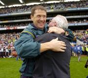 26 September 2004; Kerry manager Jack O'Connor celebrates with Sean Walsh, chairman of the Kerry County Board, at the final whistle after victory over Mayo. Bank of Ireland All-Ireland Senior Football Championship Final, Kerry v Mayo, Croke Park, Dublin. Picture credit; Brendan Moran / SPORTSFILE *** Local Caption *** Any photograph taken by SPORTSFILE during, or in connection with, the 2004 Bank of Ireland All-Ireland Senior Football Final which displays GAA logos or contains an image or part of an image of any GAA intellectual property, or, which contains images of a GAA player/players in their playing uniforms, may only be used for editorial and non-advertising purposes.  Use of photographs for advertising, as posters or for purchase separately is strictly prohibited unless prior written approval has been obtained from the Gaelic Athletic Association.